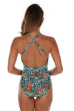 Back view of Lifestyles Direct Tan Through crisscross strap structured cup tank swimming suit for women with blue Morea print.