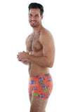 Tan through men's bike shorts -- side view -- orange Fiji.