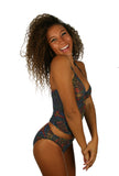 Tankini separates bikini tops in tan through multicolor Safari fabric.