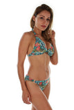 Side of tan through Lifestyles Direct blue Morea separates halter bikini top.