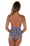 Back view of purple Durban tan through traditional tank swimsuit.
