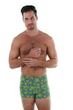 Front view of blue and green Tahiti bike shorts for men.