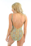 Back of tan through underwire swimsuit -- yellow Carnival print.
