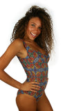 Tan through swimsuit with CD cups and underwire support in orange Heat print.