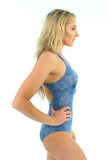 Adjustable crisscross strap tan through swimsuit with structured cups from Lifestyles Direct in blue Serpent print.