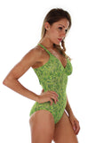 Side view of green Tahiti crisscross adjustable strap structured cup tank swimsuit