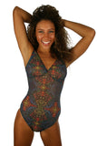 Multicolor Safari print on tan through criss cross strap structured top swimsuit from Lifestyles Direct.