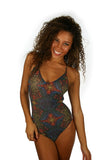 Tan through crisscross adjustable strap swimsuit in multicolor Safari print.