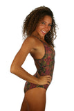 Side of womens swimsuit with crisscross adjustable straps and pink Safari print.
