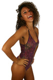 Crisscross strap bathing suit with purple Safari print.