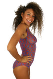 Side view -- Lifestyle Direct Tan Through womens swimsuit with structured cups.