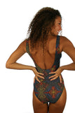 Back view of tan through swimsuit with structured cups and multicolor Safari pattern.