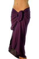 Solid purple pareo tan through swimsuit coverups.