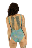Back view of green Forever underwire swimwear modeled by Nicole.