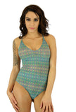 Green Forever tan through swimsuit with adjustable crisscross straps.