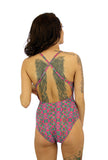 Back view of crisscross adjustable strap swimwear for women in Kaleidoscope print.