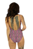 Back view -- Kaleidoscope print on adjustable strap underwire support womens bathing suit.