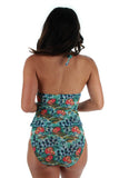 Back view of tan through high waist bikini bottom in blue Morea print.