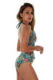 Side view of tan through bikini bottom with high waist cut and blue Morea print.