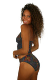 Alternate view of high waisted tan through swimsuit bottoms in multicolor Safari pattern.