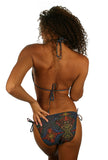 Back view of double string tie bikini bottoms in tan through multicolor Safari fabric.