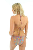 Back view -- tan through string bikini top in orange Bubbles print.