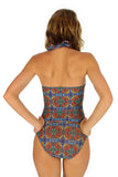 Back view of Cameo modeling tan through tankini top from Lifestyles Direct in orange Heat print.